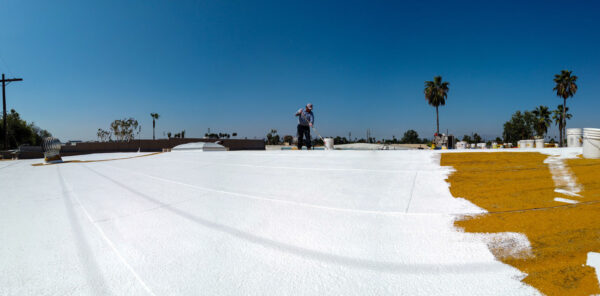 Everroof - Applying Silicone Top Coat to roof